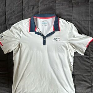 Adidas golf polo with Buffalo hills golf on left breast.